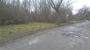 rozjazdená cesta